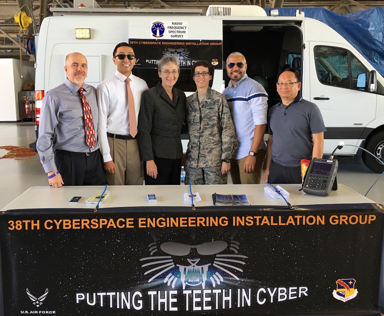 Secretary of the Air Force, Honorable Heather Wilson, poses with personnel from the 38th Cyberspace Engineering and Implementation Group during the Andrews AFB Airshow, Md, 15 Sep 2017.