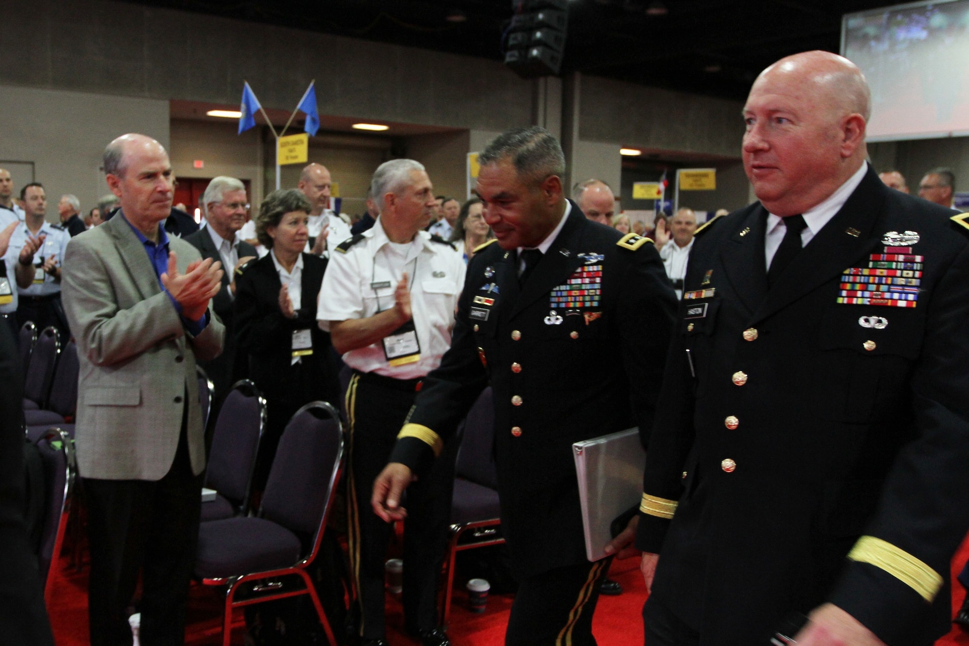 Lt. Gen. Michael Garrett approaches the stage.