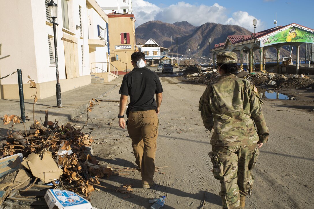 Soldiers head to a meeting with the U.S. Agency for International Development to discuss air operations, Roseau, Dominica.