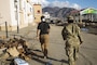 Soldiers head to a meeting with the U.S. Agency for International Development to discuss air operations, Roseau, Dominica.