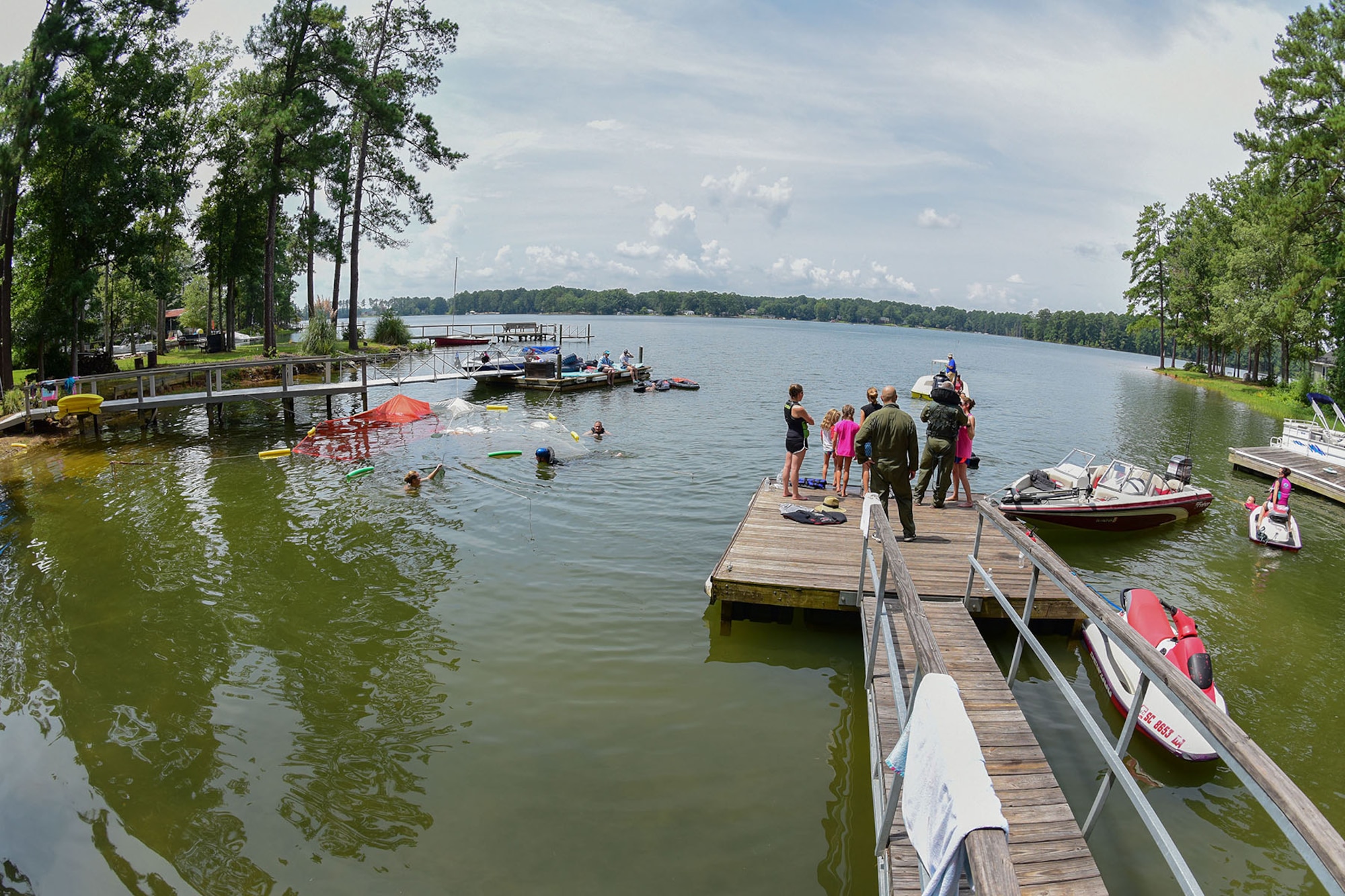 U.S. Air Force pilots assigned to the 157th Fighter Squadron, participate in water refresher training conducted in Lake Murray, located in Chapin, S.C., Aug. 13, 2017. The mandatory tri-annual training assesses the pilot’s ability to combat scenarios that may take place should they have to eject or bailout of the aircraft over water. (U.S. Air National Guard photo by Senior Airman Megan Floyd)