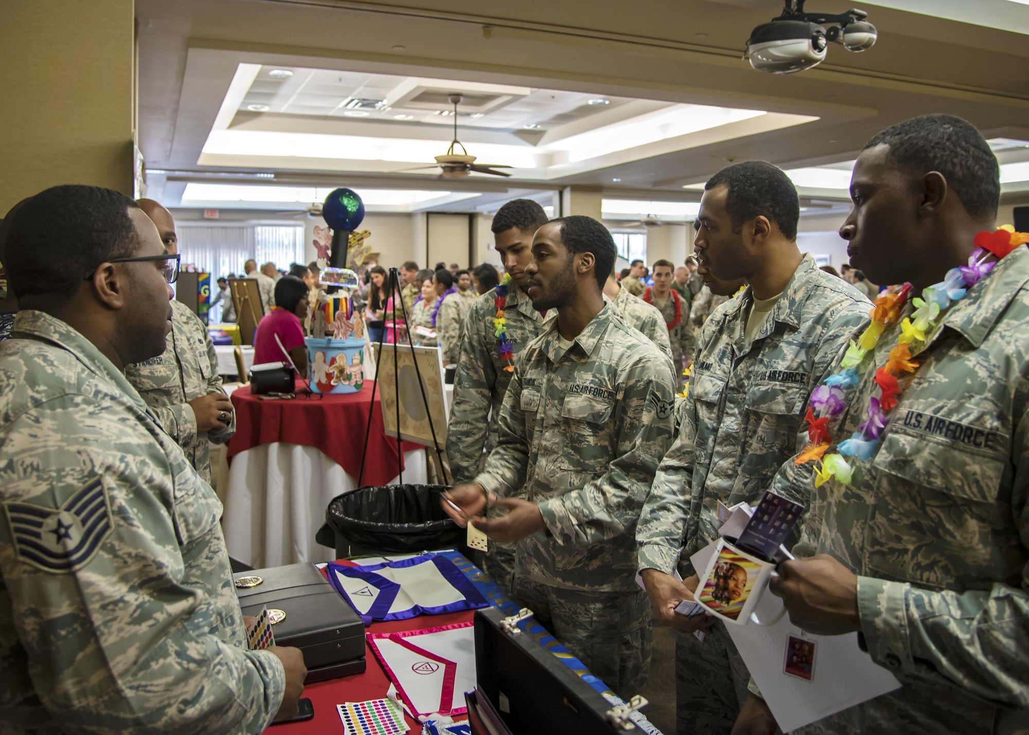 Airmen learn about a new culture from Tech Sgt. Willie Neal, 23d Maintenance Squadron munitions specialist during Diversity Day, Sept. 29, 2017, at Moody Air Force Base, Ga. Moody held Diversity Day to honor and educate Airmen on all of the ethnic groups and organizations observed by the Department of Defense. (U.S. Air Force Photo by Airman Eugene Oliver)