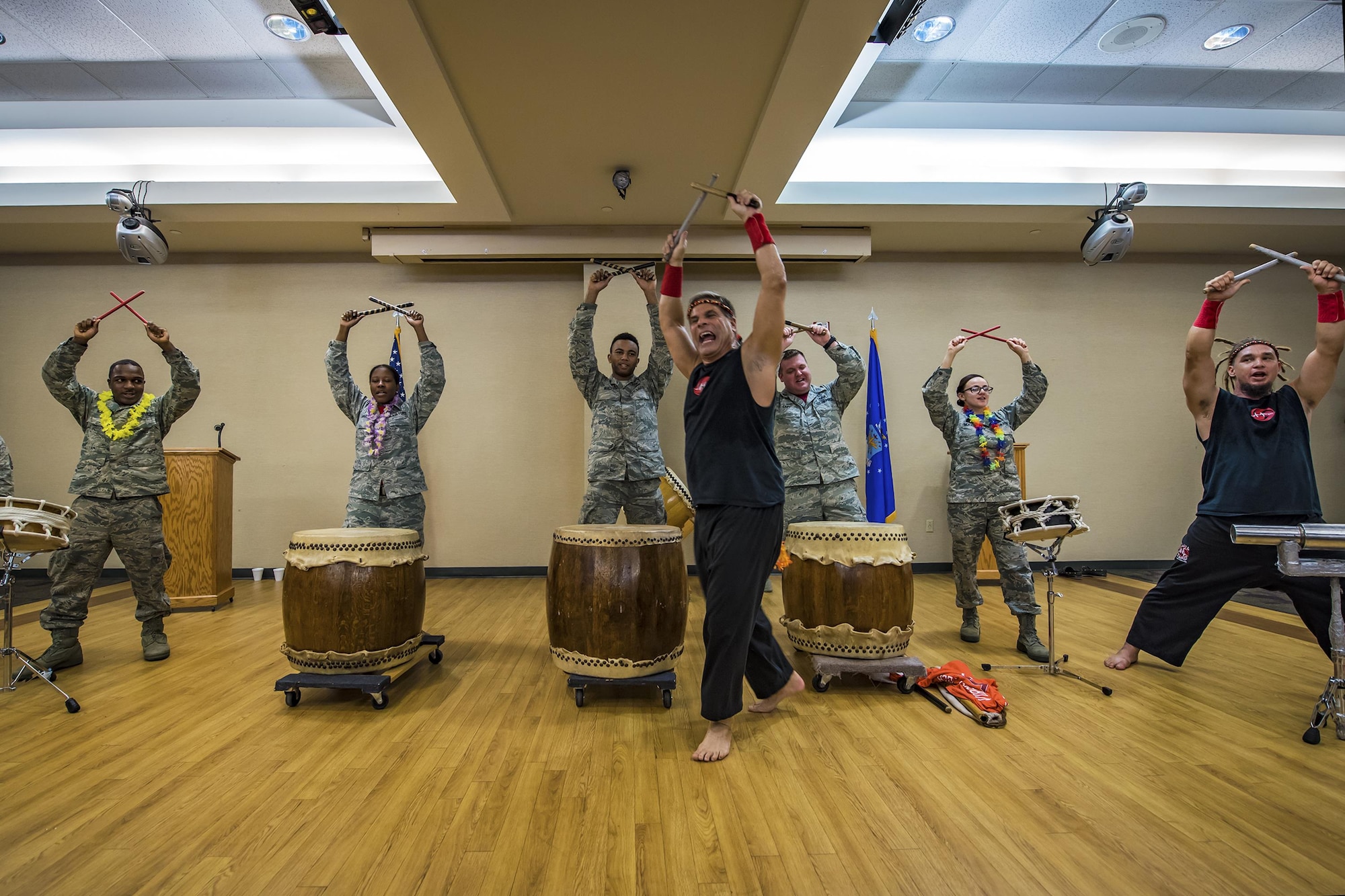 Team Moody Airmen participate in a drumming demonstration with the Tampa Taiko drummers during Diversity Day, Sept. 29, 2017, at Moody Air Force Base, Ga. Moody held Diversity Day to honor and educate on all of the ethnic groups and organizations observed by the Department of Defense. (U.S. Air Force Photo by Airman Eugene Oliver)