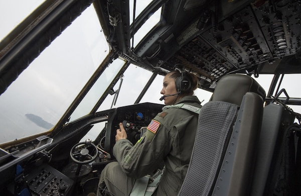 U.S. Air Force Reserve Maj. Elisa Klitzke, a pilot with the 731st Airlift Squadron, pilots a C-130 Hercules during this years Central Accord exercise in Libreville, Gabon on June 15, 2016. U.S. Army Africa’s exercise Central Accord 2016 is an annual, combined, joint military exercise that brings together partner nations to practice and demonstrate proficiency in conducting peacekeeping operations. (DoD News photo by TSgt Brian Kimball)
