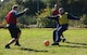 From left, U.S. Air Force Staff Sgt. Aaron Scofield and Tech. Sgt. Andrew Ibarra (red jerseys), 48th Civil Engineer Squadron firefighters, and U.S. Air Force Staff Sgt. Greg Wasiewski, 100th Civil Engineer Squadron firefighter, compete during the first round of games for the annual Battle of the Badges, Sept. 30, 2017, on RAF Mildenhall, England. In addition to soccer, the competition included games of basketball and dodgeball. (U.S. Air Force photo by Airman 1st Class Alexandria Lee)