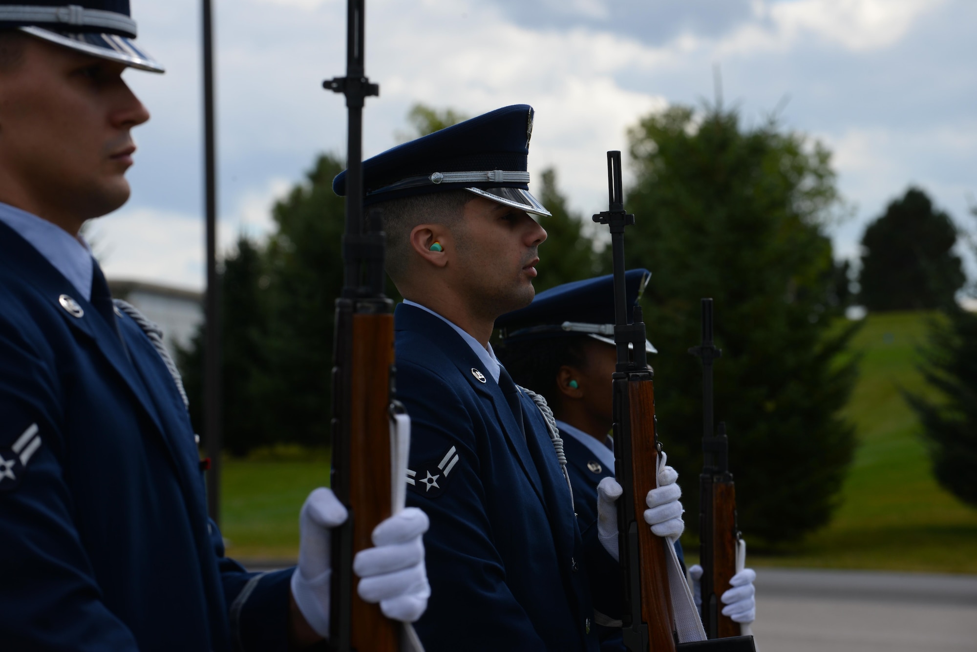 Airman 1st Class Kevin Negron, a fuels specialist assigned to the 28th Maintenance Squadron, salutes during the playing of Taps at Black Hills National Cemetery in Sturgis, S.D., Sept. 26, 2017. Ceremonial guardsmen serve in the Ellsworth Air Force Base, S.D., honor guard for one year with six months active and six months inactive. (U.S. Air Force photo by Airman Nicolas Z. Erwin)