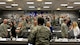 Chief Master Sgt. Shelina Frey, Air Mobility Command command chief watches as spouses read an oath to serve during AMC's fall Phoenix Rally Sept. 27 at Scott Air Force Base, Ill.