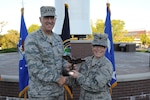 Maj. Heather Mahowald, individual mobilization augmentee to the chief of joint force development, receives the Air Force Personnel Field Grade Officer of the Year award for 2016 from U.S. Air Force Gen. John Hyten, commander of U.S. Strategic Command, during an awards ceremony at USSTRATCOM headquarters at Offutt Air Force Base, Neb., Sept. 28, 2017.