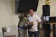 U.S. Air Force Airman Lanas Jess II, 315th Training Squadron trainee, receives the first place prize from Col. Jeffrey Sorrell, 17th Training Wing vice commander, during the Talent Show at the Crossroads on Goodfellow Air Force Base, Texas, Sept. 29, 2017. Jess played the piano and sang “Made A Way” by Travis Greene. (U.S. Air Force photo by Airman Zachary Chapman/Released)