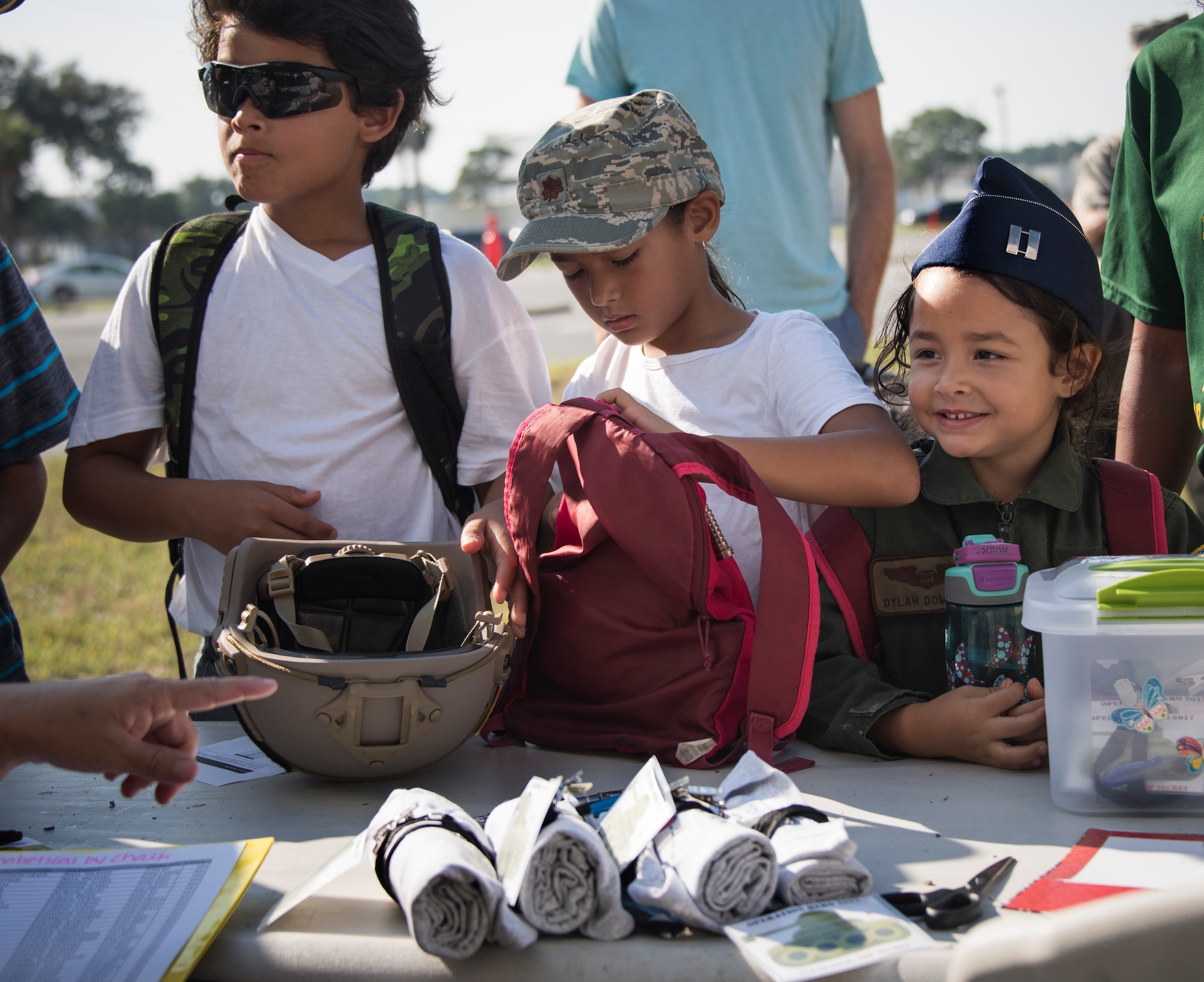 More than 470 kids participated in Operation Hero. The event was set up to show them the process their parents go through before they leave home.