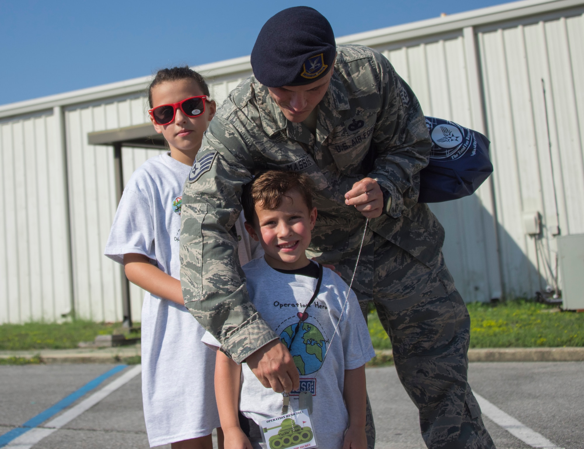 More than 470 kids participated in Operation Hero. The event was set up to show them the process their parents go through before they leave home.