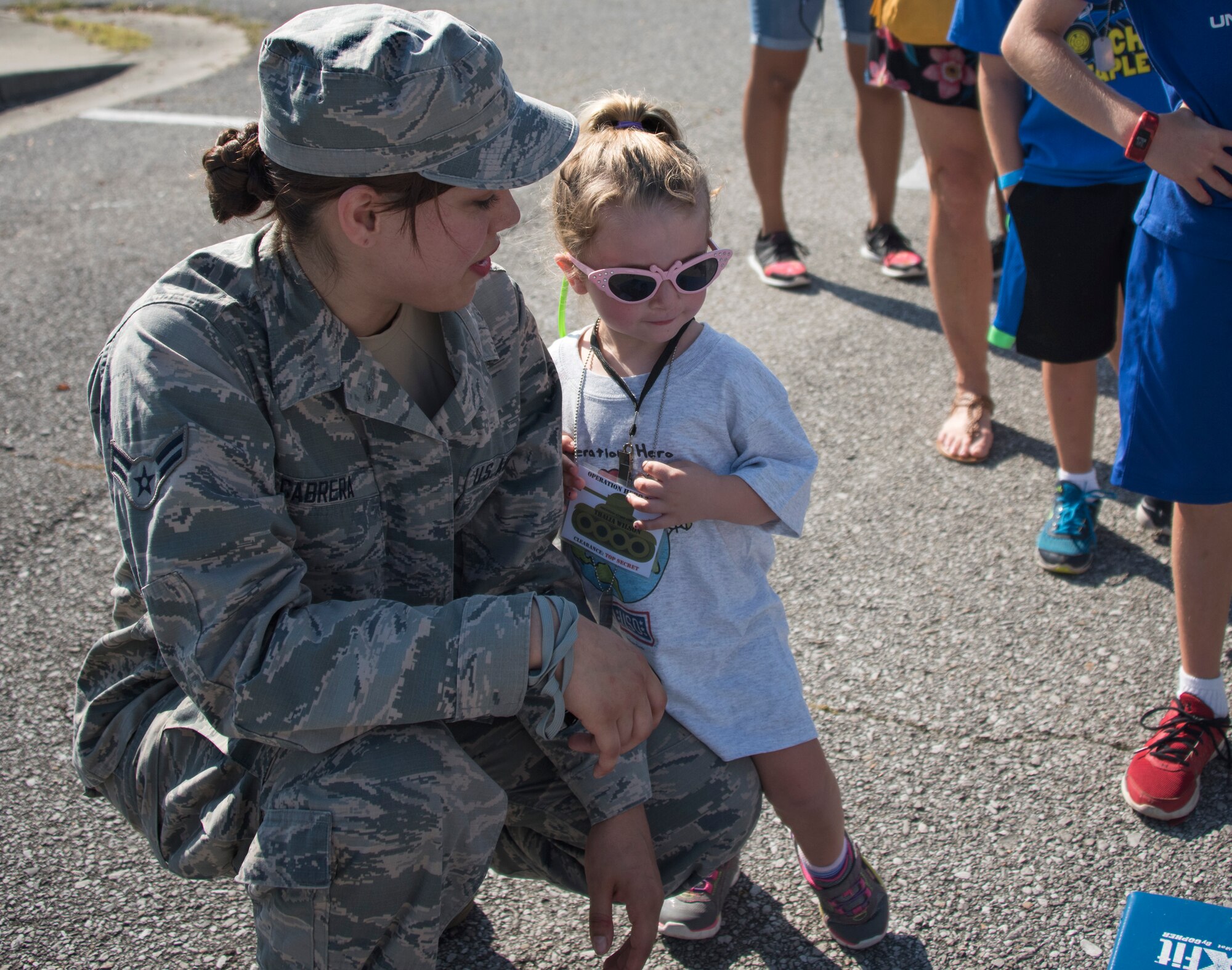 More than 470 kids participated in Operation Hero. The event was set up to show them the process their parents go through before they leave home.
