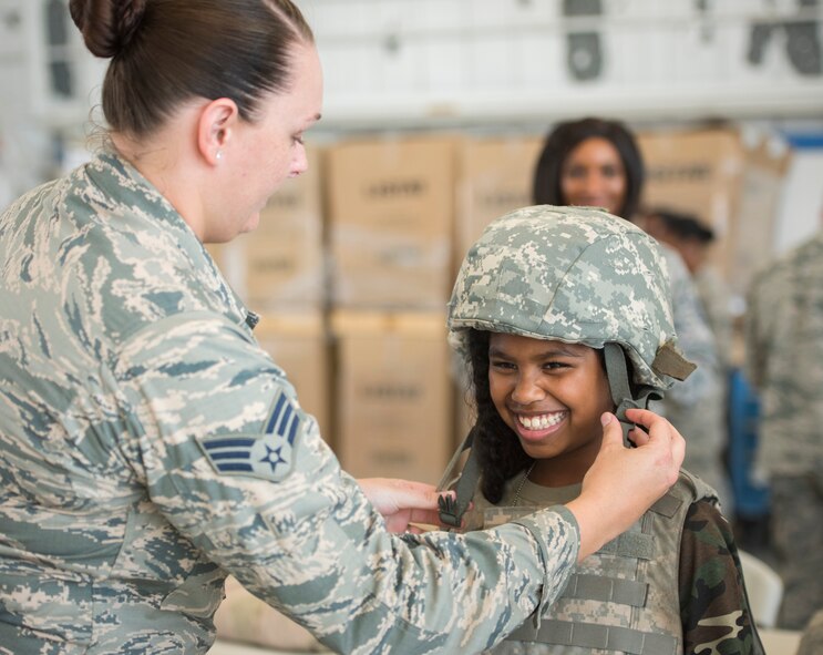 More than 470 kids participated in Operation Hero. The event was set up to show them the process their parents go through before they leave home.