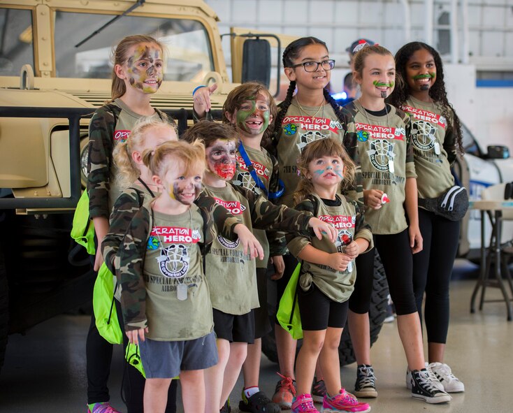 More than 470 kids participated in Operation Hero. The event was set up to show them the process their parents go through before they leave home.