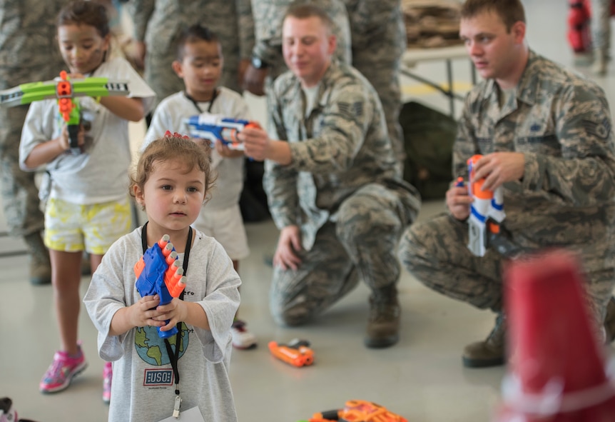 More than 470 kids participated in Operation Hero. The event was set up to show them the process their parents go through before they leave home.