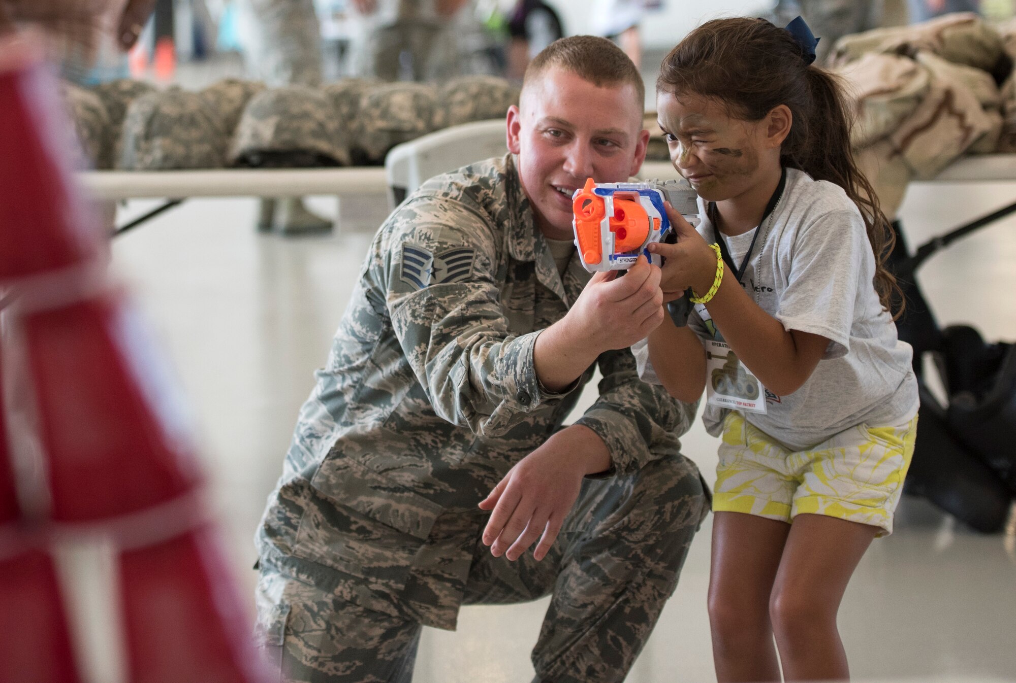 More than 470 kids participated in Operation Hero. The event was set up to show them the process their parents go through before they leave home.
