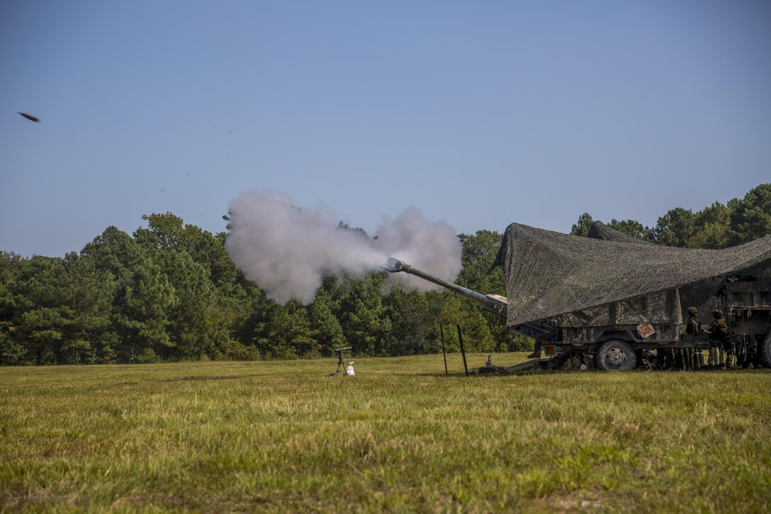 Marines fire an M777 howitzer at simulated enemy positions during a Marine Corps Combat Readiness Evaluation at Camp Lejeune, N.C., Sept. 28, 2017. The Marines conducted the MCCRE to maintain readiness for future operations. The Marines are with 1st Battalion, 10th Marine Regiment. (U.S. Marine Corps photo by Lance Cpl. Taylor W. Cooper)