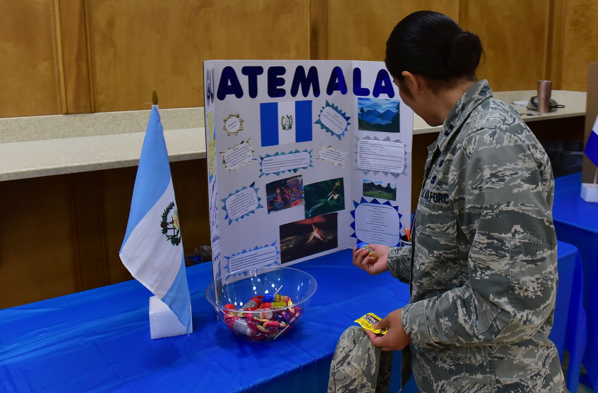 Capt. Christina Salinas, 314th Maintenance Squadron officer in charge of maintenance operations, reads about the history of Guatemala at the Hispanic Heritage Info Fair Sept. 29, 2017, at Walter’s Community Support Center on Little Rock Air Force Base, Ark. There were booths featuring 20 different Hispanic countries. (U.S. Air Force photo by Airman Rhett Isbell)