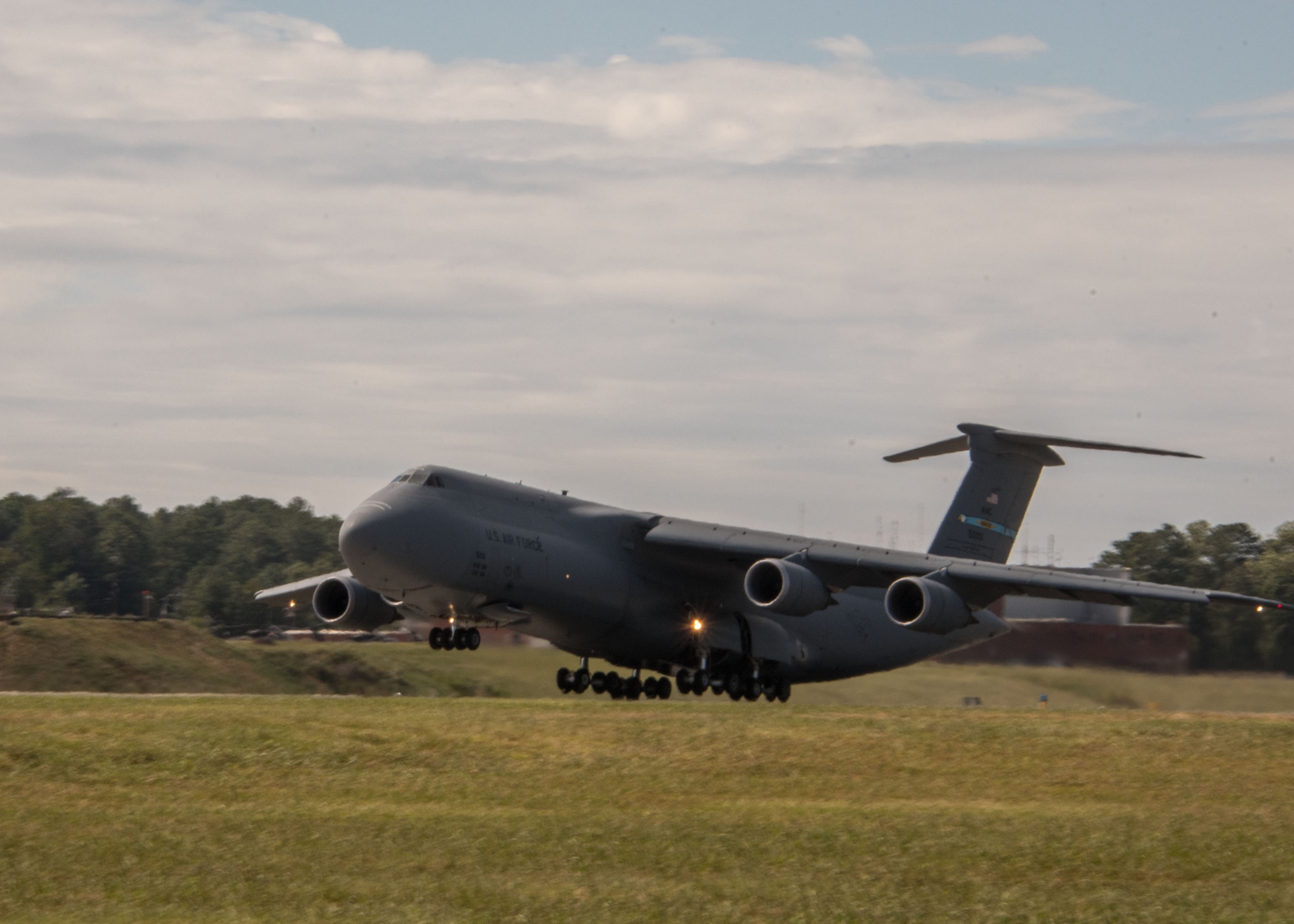 A C-5M Super Galaxy from Dover Air Force Base, Del. takes off at Dobbins Air Reserve Base, Ga. Oct. 2, 2017. The plane took vital communication equipment as well as AT&T Network Disaster Recovery Team members to provide communication support to Puerto Rico in the wake of Hurricane Maria’s destruction. (U.S. Air Force photo/Staff Sgt. Andrew Park)