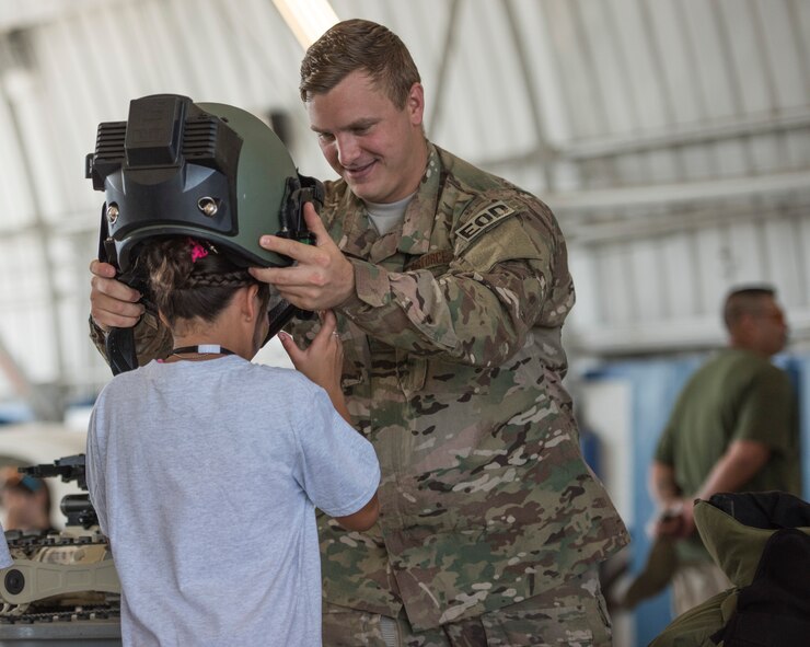 More than 470 kids participated in Operation Hero. The event was set up to show them the process their parents go through before they leave home.