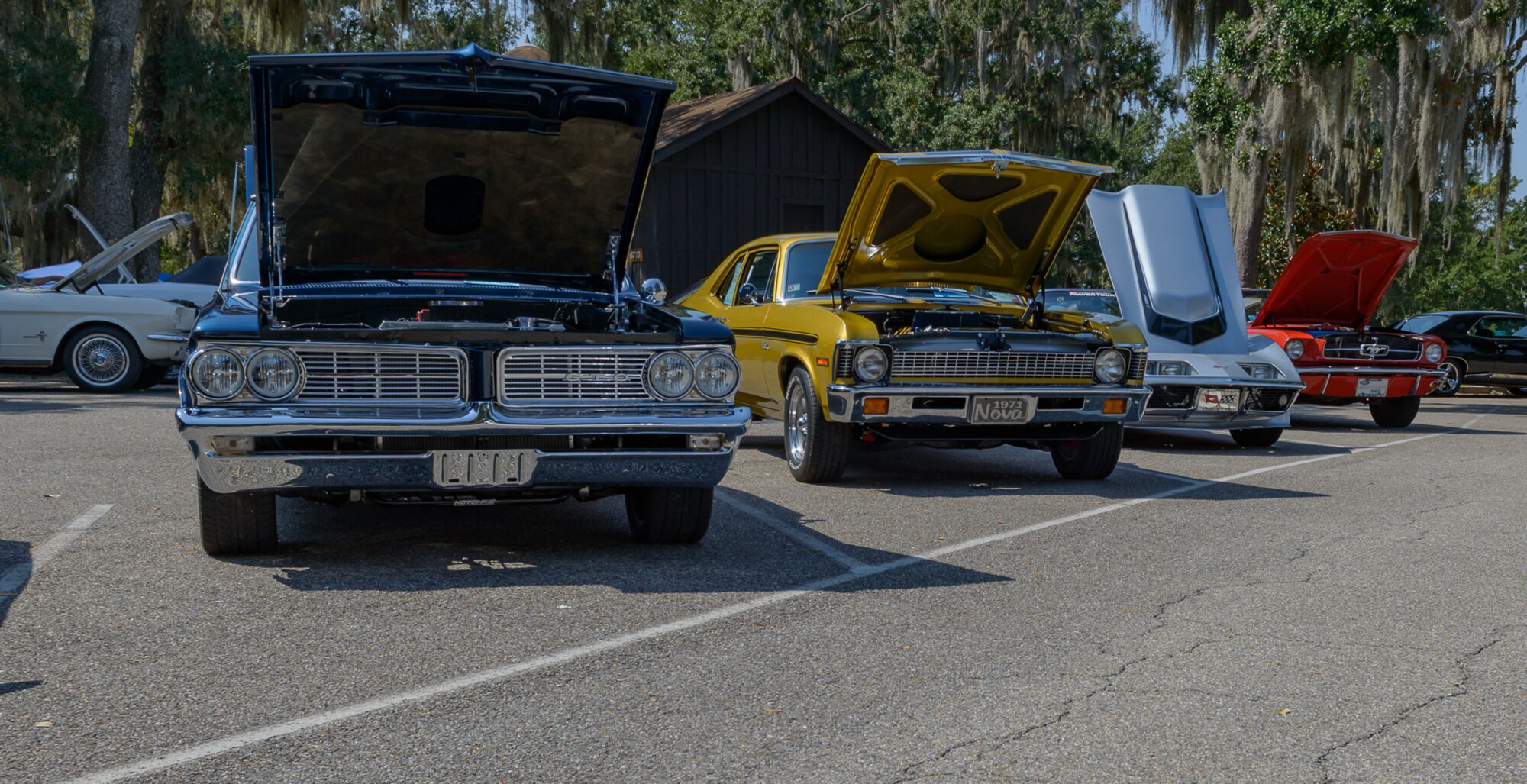 Antique vehicles are lined up for prospective viewing at The Marina Park during the 14th Annual Cruisin’ Keesler Car Show on Sept. 30, 2017, at Keesler Air Force Base, Mississippi. The annual car show is held to kick off Cruisin’ the Coast, a festival to celebrate classic cars, trucks and hot rods, where vehicles cruise down the 30-mile beachside highway in Mississippi. There were over 300 visitors and 130 classic vehicle entries with 15 awards presented. (U.S. Air Force photo by Andre’ Askew)