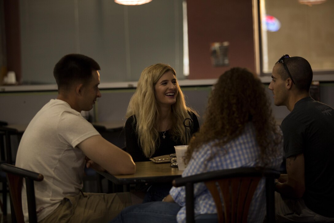 U.S. Marines and Sailors stationed at Marine Corps Air Station Yuma, Ariz., gather at the Sonoran Pueblo on Sept. 16, 2017, to watch the Canelo Alvarez and Gennady Golovkin boxing match. Marine Corps Community Services planned the event for Marines, Sailors and their families to watch and enjoy together. (U.S. Marine Corps photo taken by Lance Cpl. Sabrina Candiaflores)