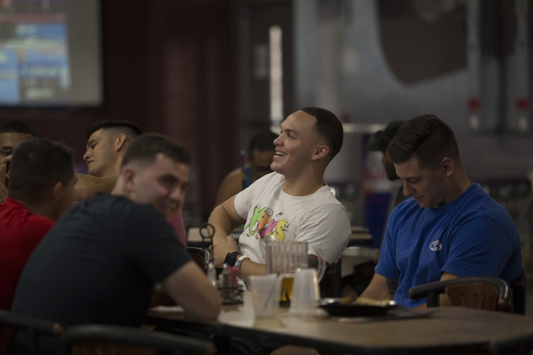 U.S. Marines and Sailors stationed at Marine Corps Air Station Yuma, Ariz., gather at the Sonoran Pueblo on Sept. 16, 2017, to watch the Canelo Alvarez and Gennady Golovkin boxing match. Marine Corps Community Services planned the event for Marines, Sailors and their families to watch and enjoy together. (U.S. Marine Corps photo taken by Lance Cpl. Sabrina Candiaflores)