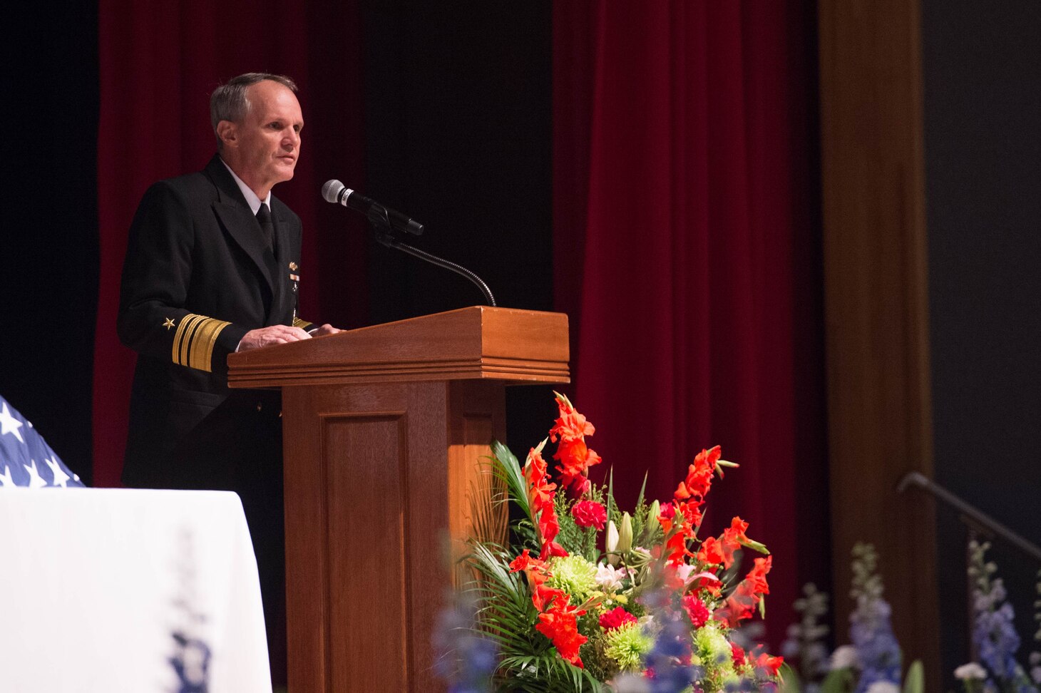YOKOSUKA, Japan (Oct. 4, 2017) – Vice Adm. Phillip G. Sawyer addresses attendees of the USS John S. McCain Memorial Service at Fleet Activities Yokosuka Fleet Theater, Oct. 4. Family, shipmates, and other Yokosuka community members attended the memorial to honor the 10 McCain Sailors who perished following the destroyer’s Aug. 21 collision at sea.