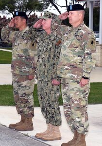 (From left) Maj. Gen. K.K. Chinn, Adm. Kurt Tidd and incoming Army South commander Maj. Gen. Mark R. Stammer salute the colors as the National Anthem is played during today's change of command ceremony.