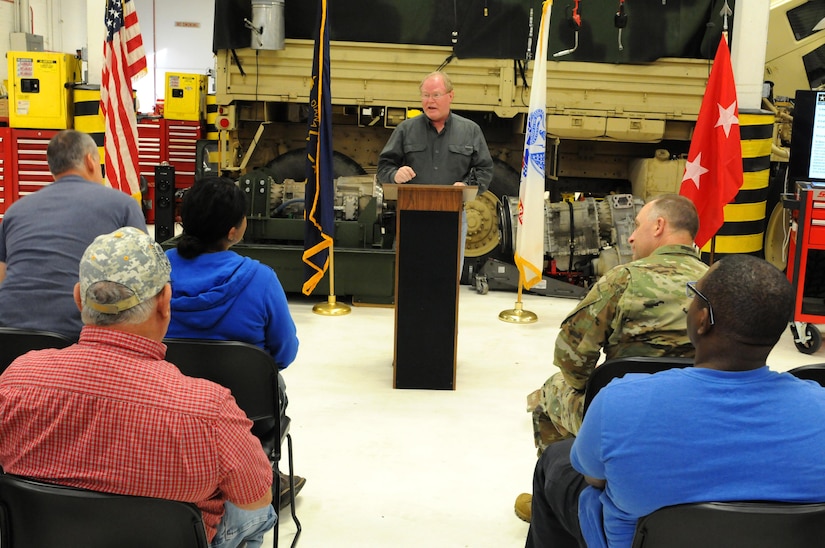 Paul Harvey, the heavy mobile equipment repairer supervisor for Area Maintenance Support Activity 131, in Jeffersonville, Indiana, speaks to his shop and Maj. Gen. Patrick Reinert, commanding general of the 88th Regional Support Command, during an awards ceremony honoring AMSA 131 for winning of the Level I, Company TDA category of the Fiscal Year 2016 Supply Excellence Awards (SEA) for the U.S. Army Reserve.