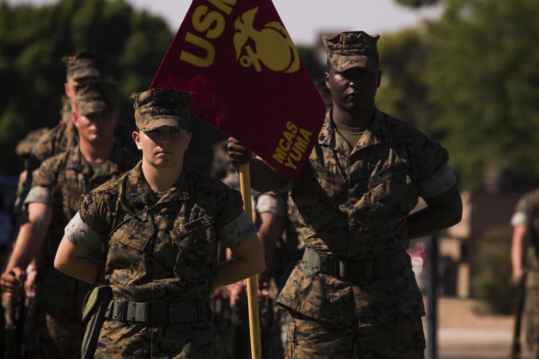 U.S. Marine Corps 1st Lt. Samantha Hefley, a military police officer with the Marine Corps Air Station Yuma, Ariz., Provost Marshal's Office, commands a platoon during the MCAS Yuma change of command ceremony held at the parade field Tuesday, June 27, 2017. During the ceremony, Col. Ricardo Martinez, the outgoing commanding officer, relinquished his command to Col. David A. Suggs, the oncoming commanding officer. (U.S. Marine Corps photo taken by Lance Cpl. Christian Cachola)