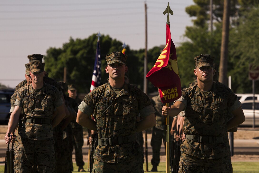U.S. Marine Corps Capt. Louis Stramaglia, a pilot with Marine Corps Air Station Yuma, Ariz., Search and Rescue Unit, commands a platoon during the MCAS Yuma change of command ceremony held at the parade field Tuesday, June 27, 2017. During the ceremony, Col. Ricardo Martinez, the outgoing commanding officer, relinquished his command to Col. David A. Suggs, the oncoming commanding officer. (U.S. Marine Corps photo taken by Lance Cpl. Christian Cachola)