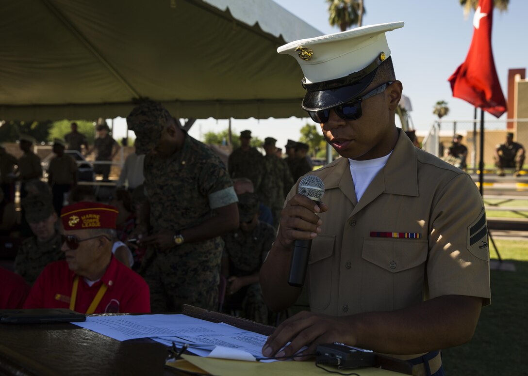 U.S. Marine Corps Cpl. Herman Nelson, a flight equipment technician with Marine Corps Air Station Yuma, Ariz., Search and Rescue Unit, narrates during the MCAS Yuma change of command ceremony held at the parade field Tuesday, June 27, 2017. During the ceremony, Col. Ricardo Martinez, the outgoing commanding officer, relinquished his command to Col. David A. Suggs, the oncoming commanding officer. (U.S. Marine Corps photo taken by Lance Cpl. Christian Cachola)