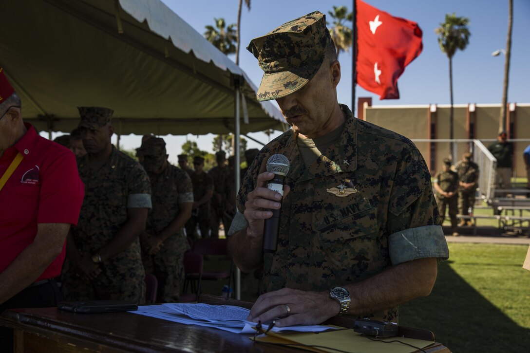 U.S. Navy Cmdr. David Slater, the Marine Corps Air Station Yuma, Ariz., command chaplain, gives the invocation during the MCAS Yuma change of command ceremony held at the parade field Tuesday, June 27, 2017. During the ceremony, Col. Ricardo Martinez, the outgoing commanding officer, relinquished his command to Col. David A. Suggs, the oncoming commanding officer. (U.S. Marine Corps photo taken by Lance Cpl. Christian Cachola)
