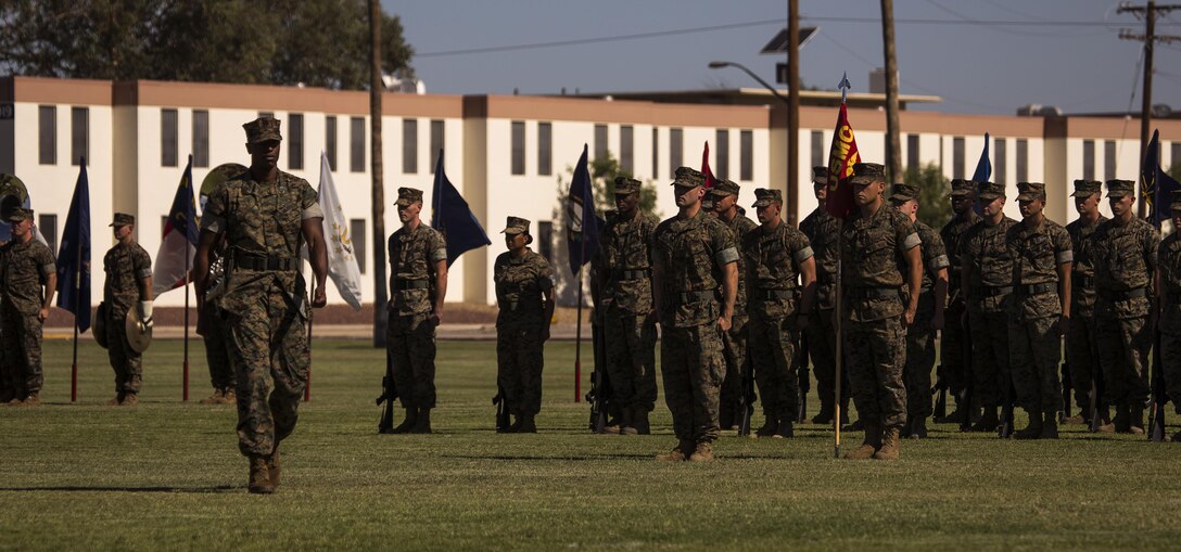 U.S. Marine Corps Capt. Herman Haynes, the Marine Corps Air Station Yuma, Ariz., station adjutant, calls troops to order during the MCAS Yuma change of command ceremony held at the parade field Tuesday, June 27, 2017. During the ceremony, Col. Ricardo Martinez, the outgoing commanding officer, relinquished his command to Col. David A. Suggs, the oncoming commanding officer. (U.S. Marine Corps photo taken by Lance Cpl. Christian Cachola)