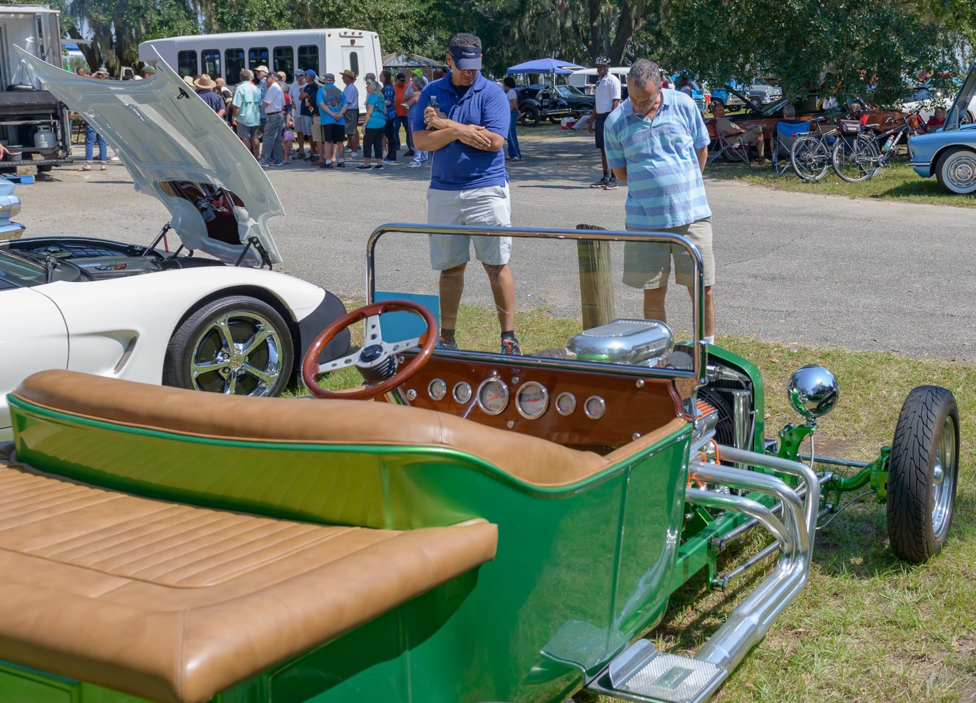 Petty Officer 2nd Class Gelardo BurgesAviles, Aerographers Weather School student and Chief Master Sgt. Harley Delp, Pennsylvania Air National Guard 111th Attack Wing communication flight superintendent, inspect a 1923 Model T Roadster at The Marina Park during the 14th Annual Cruisin’ Keesler Car Show Sept. 30, 2017, on Keesler Air Force Base, Mississippi. The annual car show is held to kick off Cruisin’ the Coast, a festival to celebrate classic cars, trucks and hot rods, where vehicles cruise down on the 30-mile beachside highway in Mississippi. There were over 300 visitors and 130 classic vehicle entries with 15 awards presented. (U.S. Air Force photo by Andre’ Askew)