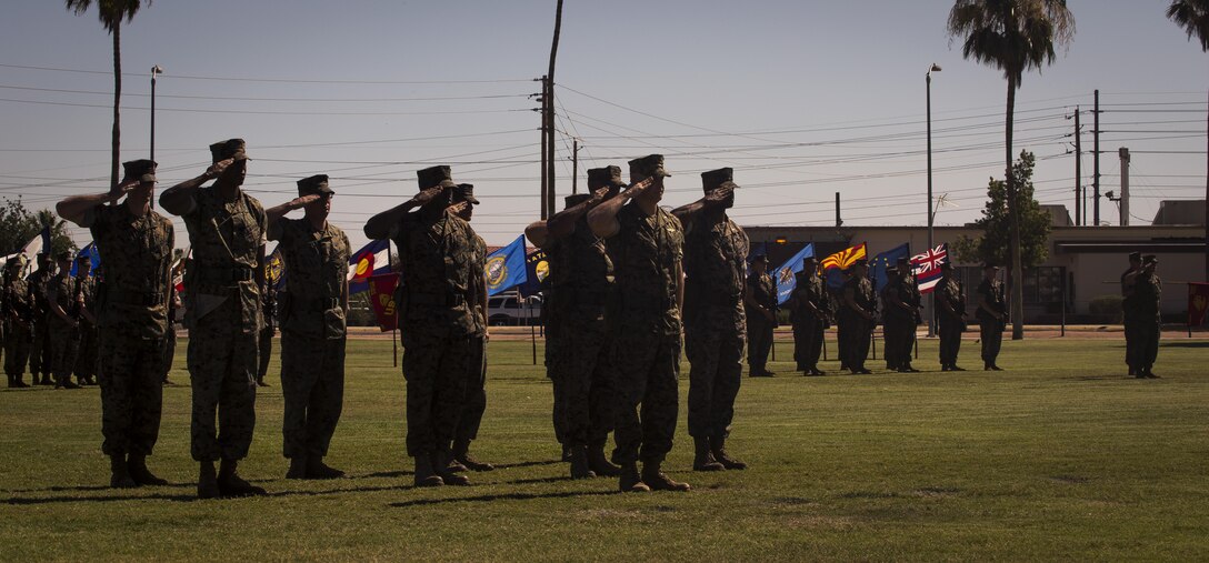 U.S. Marine Corps Maj. Michael Martin, the Marine Corps Air Station Yuma, Ariz., Headquarters and Headquarters Squadron executive officer, gives the report to Col. Ricardo Martinez after forming the troops during the MCAS Yuma change of command ceremony held at the parade field Tuesday, June 27, 2017. During the ceremony, Col. Ricardo Martinez, the outgoing commanding officer, relinquished his command to Col. David A. Suggs, the oncoming commanding officer. (U.S. Marine Corps photo taken by Lance Cpl. Christian Cachola)