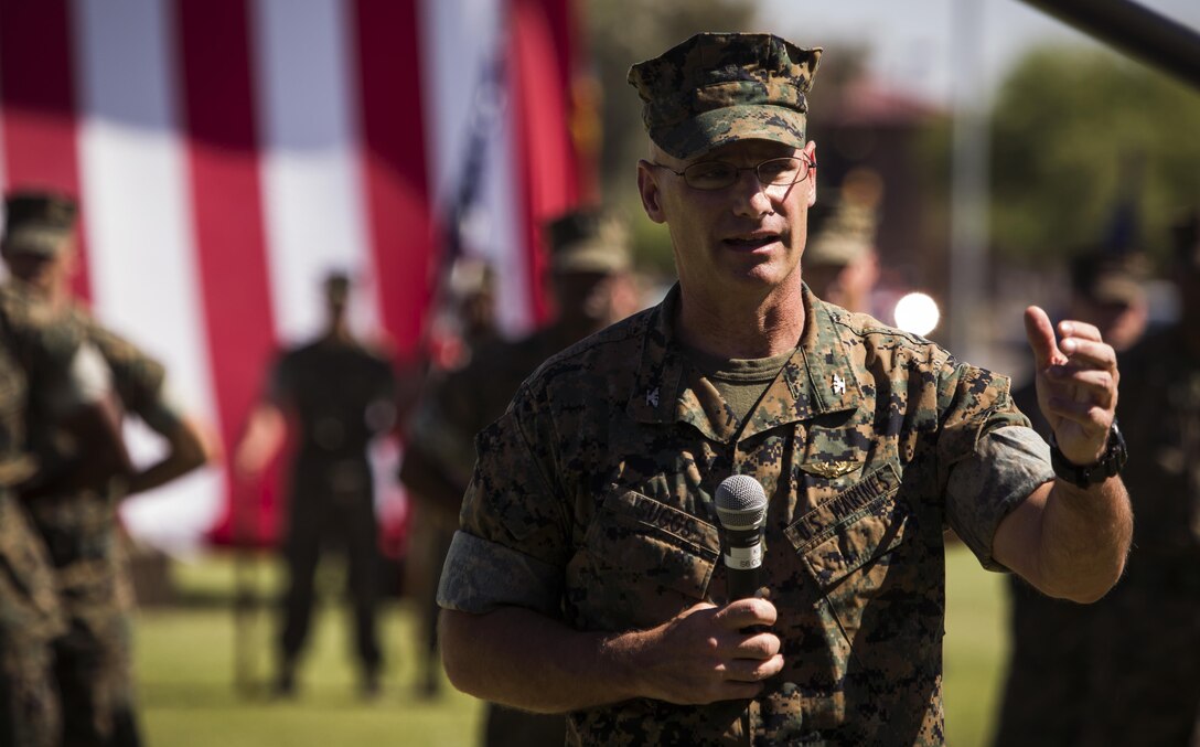 U.S. Marine Corps Col. David A. Suggs gives his first remarks as the Marine Corps Air Station Yuma commanding officer during the MCAS Yuma, Ariz., change of command ceremony held at the parade field Tuesday, June 27, 2017. During the ceremony, Col. Ricardo Martinez, the outgoing commanding officer, relinquished his command to Col. David A. Suggs. (U.S. Marine Corps photo taken by Lance Cpl. Christian Cachola)