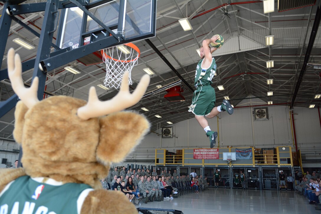 Airmen of the 115th Fighter Wing and their families were able to take a break together, at the end of the regularly scheduled drill day, Sept. 9 at Truax Field, Madison, Wisconsin to enjoy a visit from Milwaukee Bucks' Rashad Vaughn and the Rim Rockers and Hoop Troop, along with the Milwaukee Bucks Dancers and Bango, the Bucks mascot. (U.S. Air National Guard photo by Staff Sgt. Kyle Russell, 115th Fighter Wing Public Affairs)