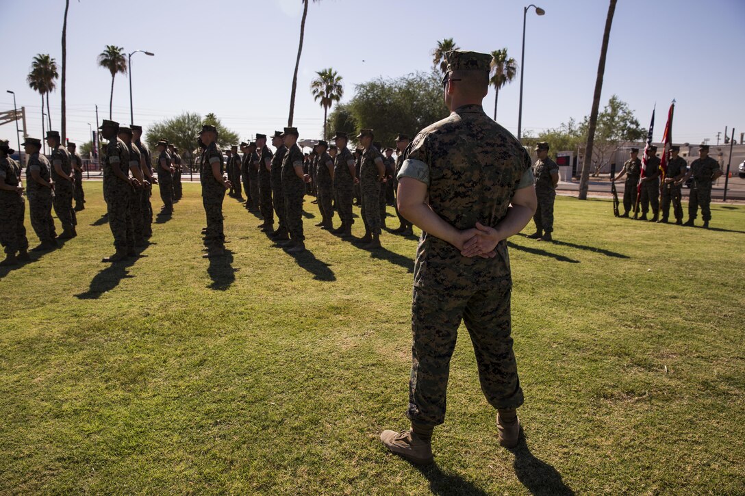 U.S. Marine Corps Gunnery Sgt. Jason Hope, the Marine Corps Air Station (MCAS) Yuma, Ariz., Headquarters and Headquarters Squadron squadron gunnery sergeant, forms the troops during Sgt. Maj. Delvin R. Smythe's, the MCAS Yuma sergeant major, retirement ceremony, June 30, 2017. (U.S. Marine Corps photo taken by Lance Cpl. Christian Cachola)