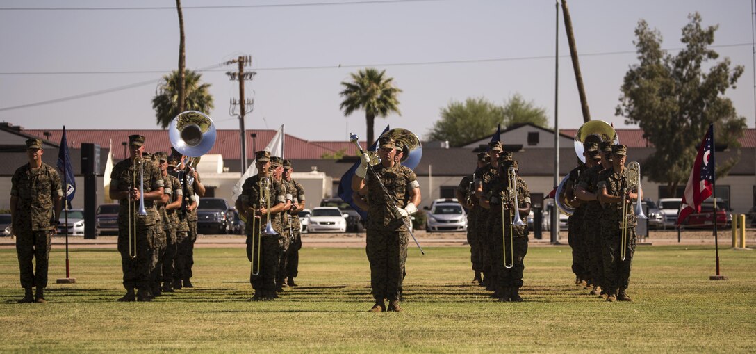 U.S. Marines with the 3rd Marine Aircraft Wing Band perform at Marine Corps Air Station (MCAS) Yuma, Ariz., during Sgt. Maj. Delvin R. Smythe's, the MCAS Yuma sergeant major, retirement ceremony, June 30, 2017. (U.S. Marine Corps photo taken by Lance Cpl. Christian Cachola)