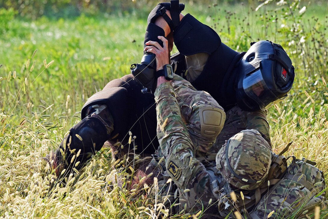 U.S. soldiers practice combative drills at Rivolto Air Base in Udine, Italy.