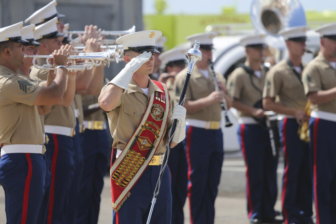 The 3rd Marine Aircraft Wing Band performs during the opening ceremony of the 2017 Marine Corps Air Station Miramar Air Show at MCAS Miramar, Calif., Sept. 22. The theme for the air show is “A Salute to Vietnam Veterans” and features several performances and displays recognizing the sacrifices of Vietnam veterans. The air show also showcases world-class civilian performers, military flight demonstration teams, capabilities of the Marine Air-Ground Task Force and celebrates our longstanding relationship with our neighbors in the local San Diego community. (U.S. Marine Corps photo by Cpl. Andi Talbot/Released)