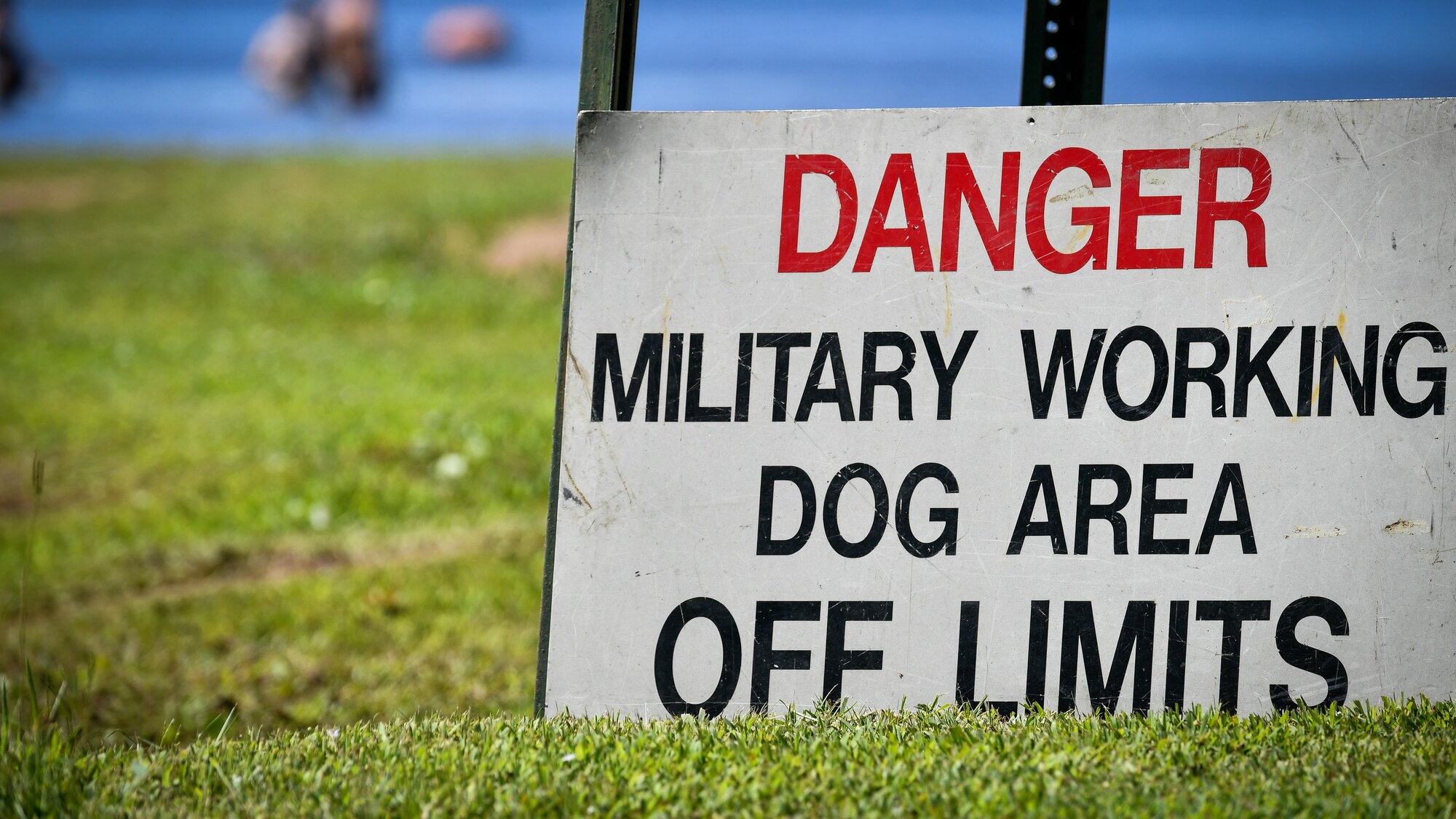 A warning sign is posted outside the sealed off training at Black Bayou Lake in Benton, La., Sept. 6, 2017. The sign was posted to warn patrons of the presence of military working dogs in the Cypress Black Bayou Recreation Area.