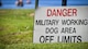 A warning sign is posted outside the sealed off training at Black Bayou Lake in Benton, La., Sept. 6, 2017. The sign was posted to warn patrons of the presence of military working dogs in the Cypress Black Bayou Recreation Area.