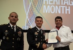 (Left to Right) Army 1st Sgt. Maximo Nunez and DLA Distribution Susquehanna, Pennsylvania commander Brad Eungard present a certificate of appreciation to Dante Sobrevilla for his participation in the Hispanic Heritage Month event at DLA Distribution Headquarters on Sept. 20.
