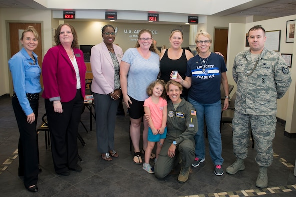 Fallen Airman’s sister receives Scott’s first Gold Star Family Card