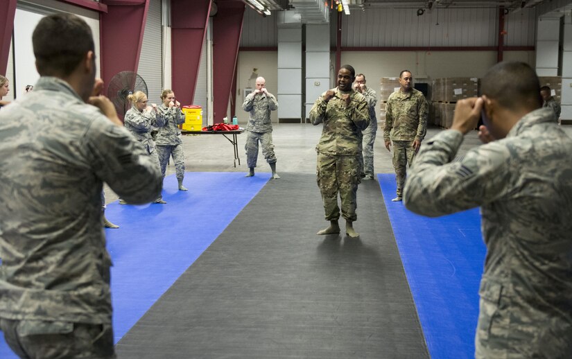 Joint Base Charleston Airmen participate in an Army combative training class at McCrady Army National Guard Training Center, S.C., Sept. 27, 2017.