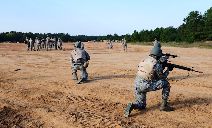 Joint Base Charleston Airmen practice low crawling during a modified version of Warfighter Skills Training at McCrady Army National Guard Training Center, S.C., Sept. 25, 2017.