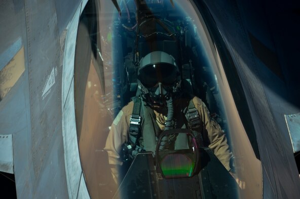An Air Force F-22 Raptor receives fuel from a KC-135 Stratotanker.